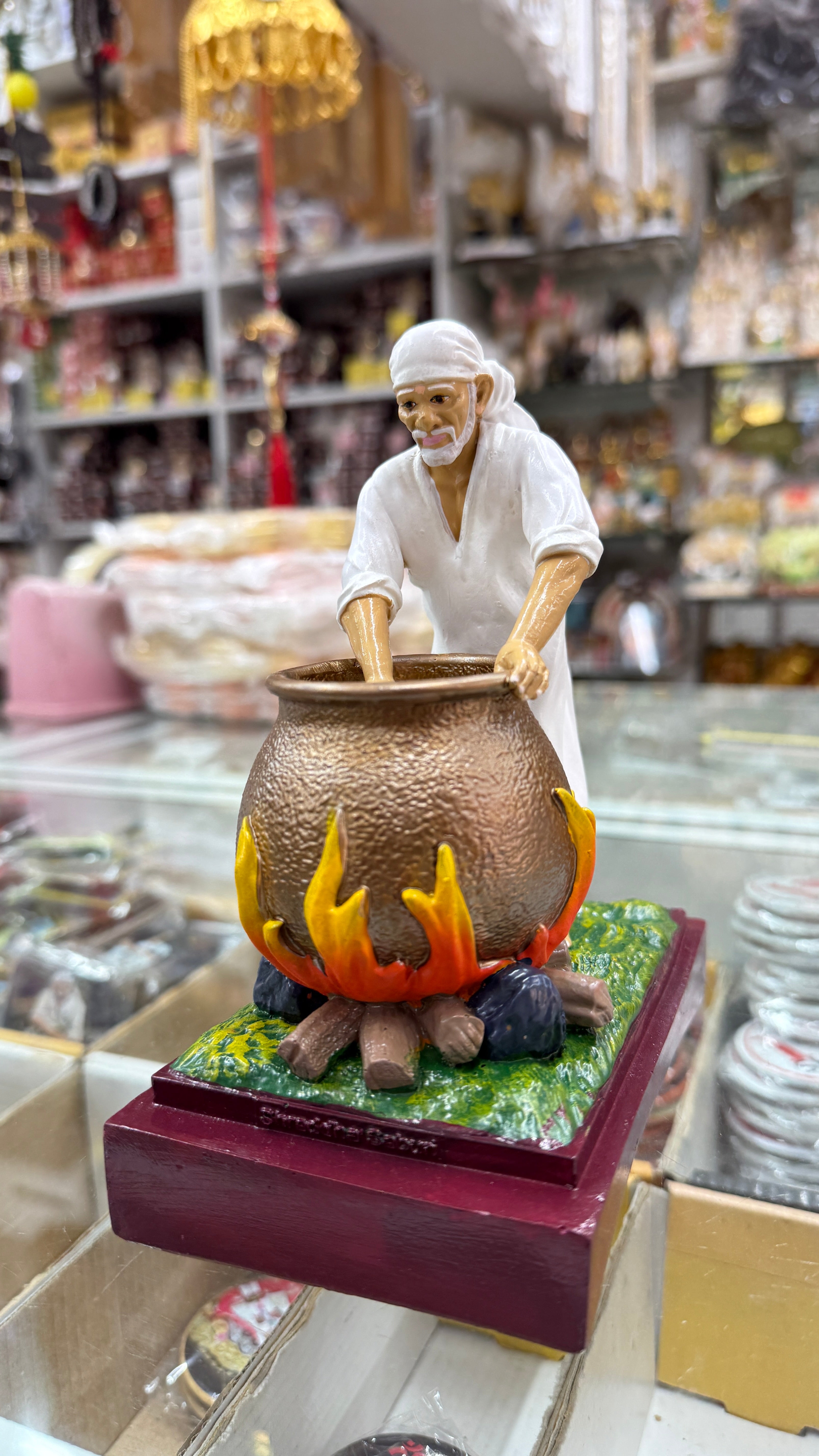 Sai Baba Making Food Handi