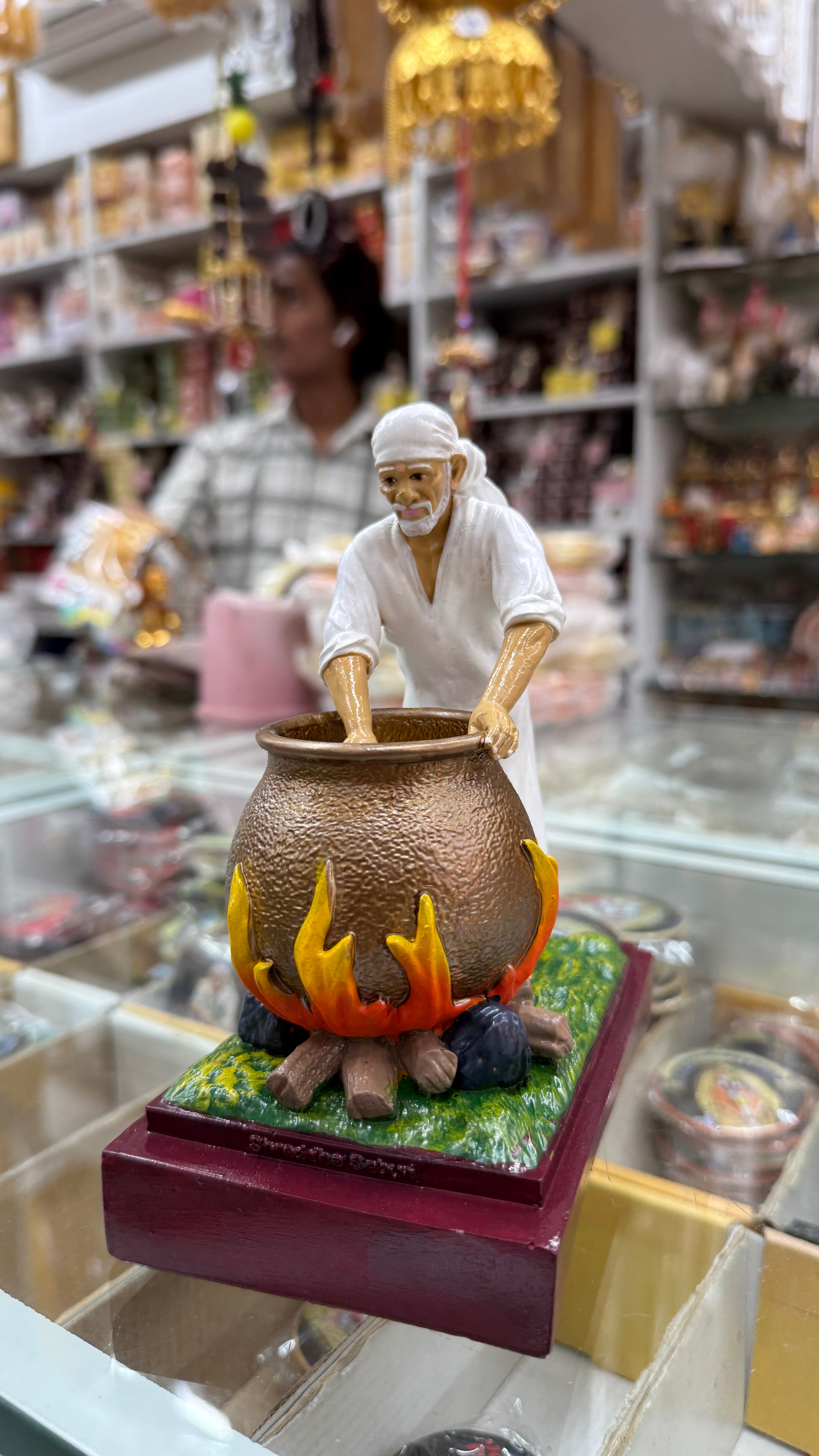 Sai Baba Making Food Handi