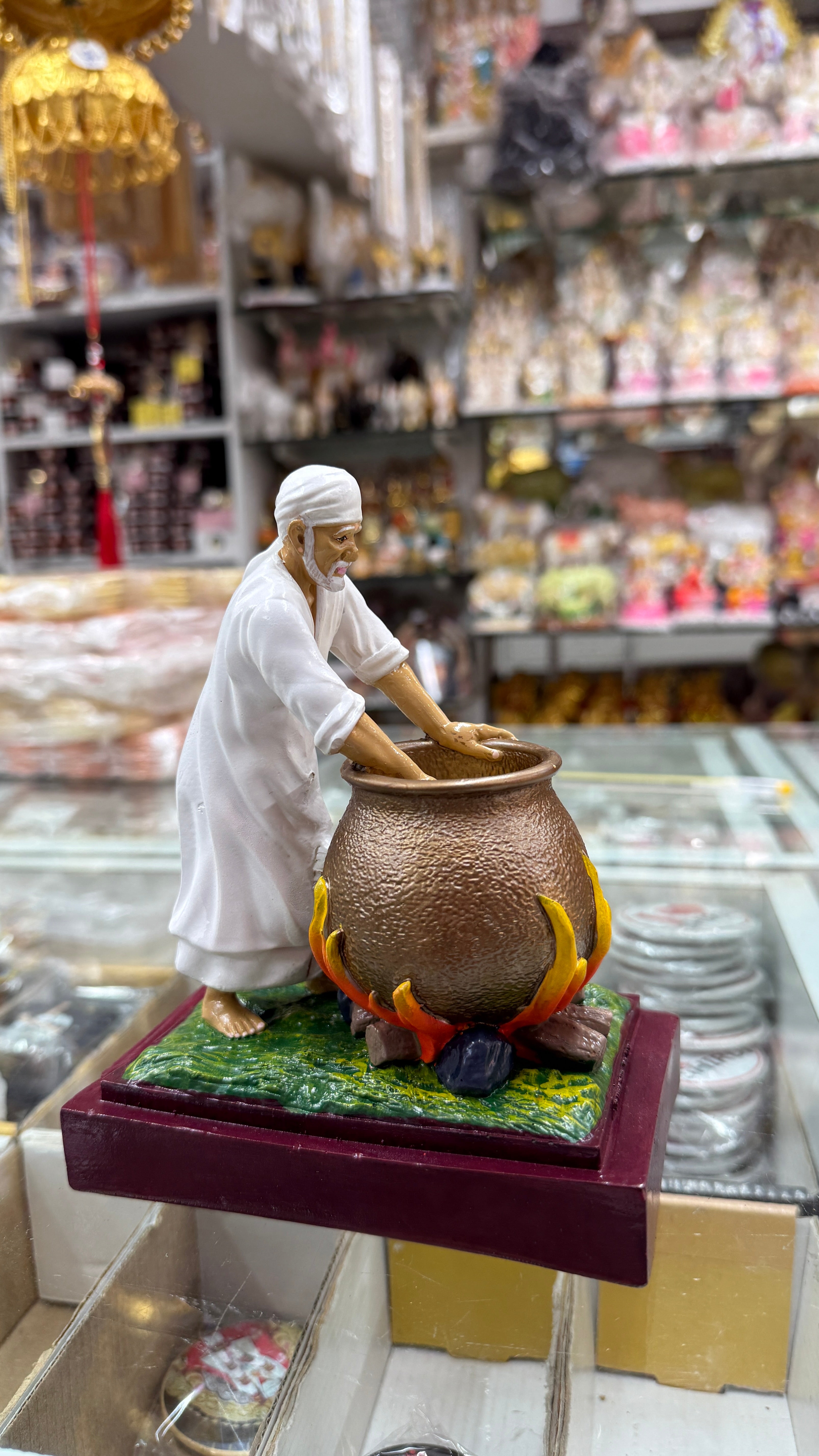 Sai Baba Making Food Handi